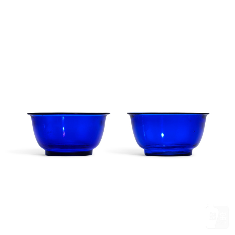 A pair of blue glass bowls, Qing dynasty, 18th - 19th century | 清十八至十九世紀 藍料光素盌一對 《乾隆年製》仿款